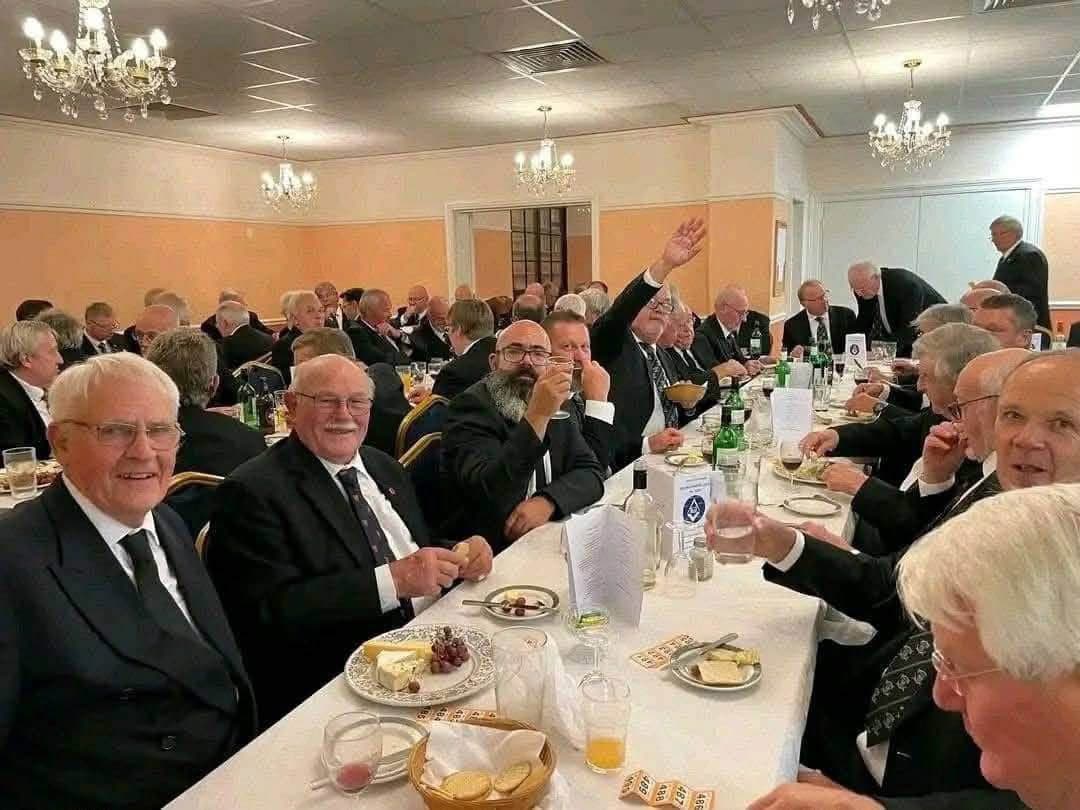 Rich Illumination members celebrating success at a group event
